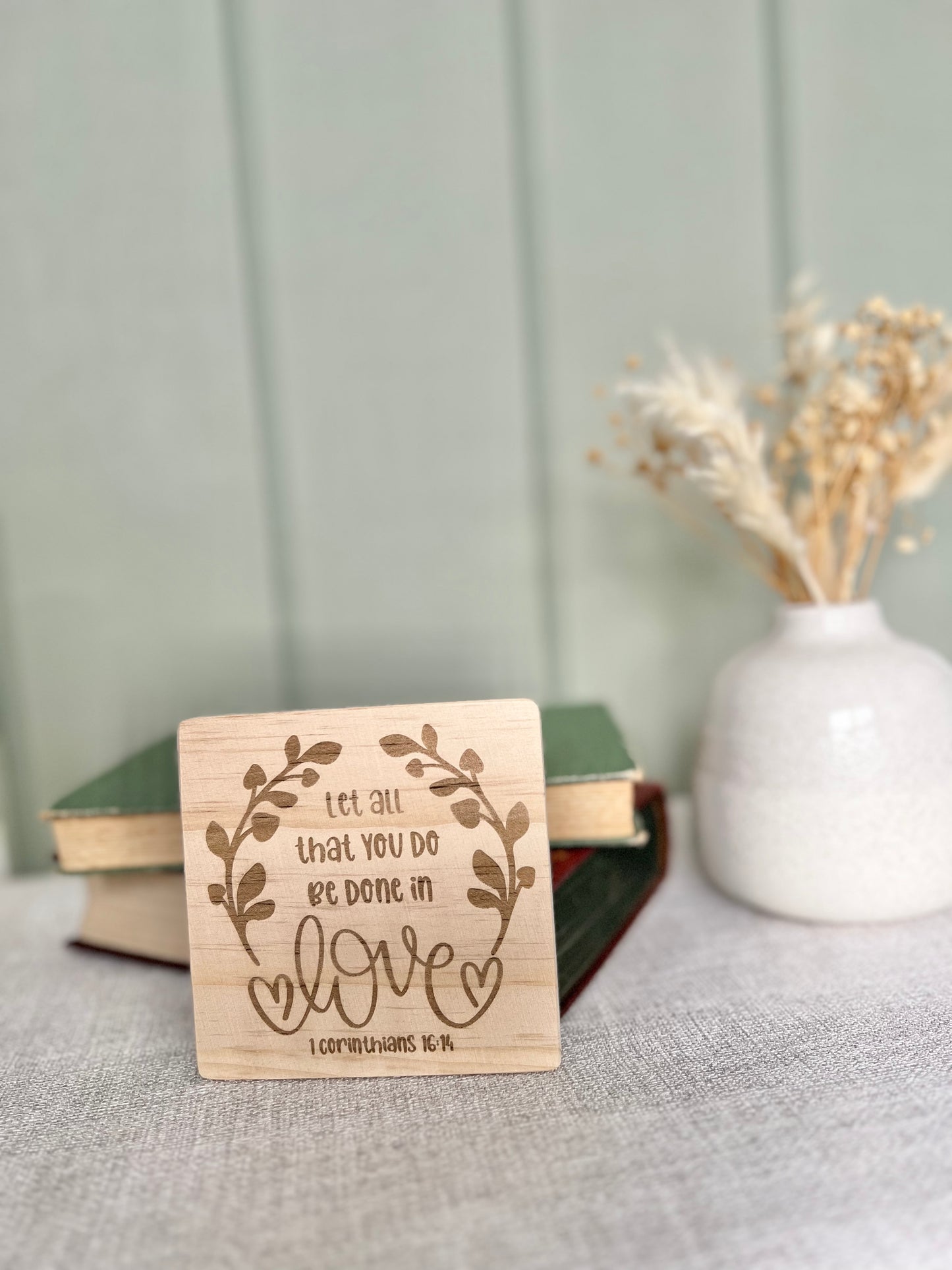 Let all that you do be done in love engraved wooden coaster