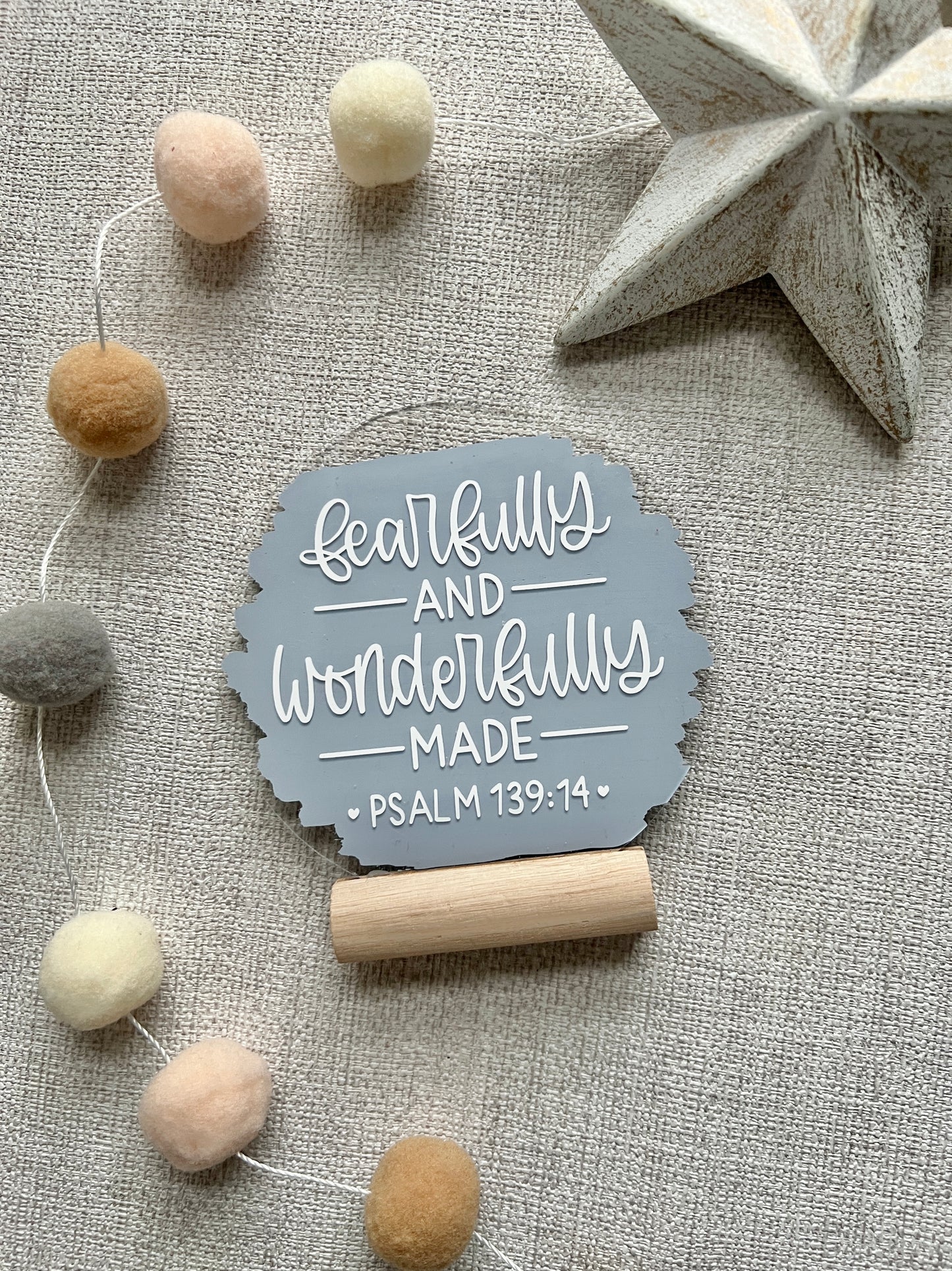 Fearfully and wonderfully made acrylic plaque