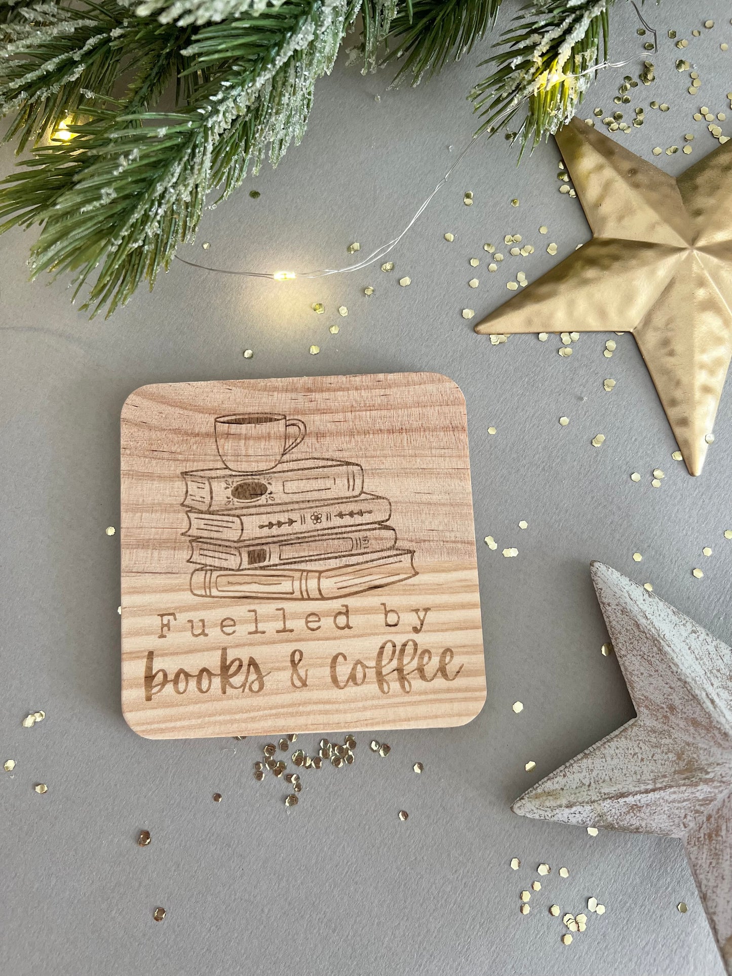Fuelled by books and coffee engraved wooden coaster