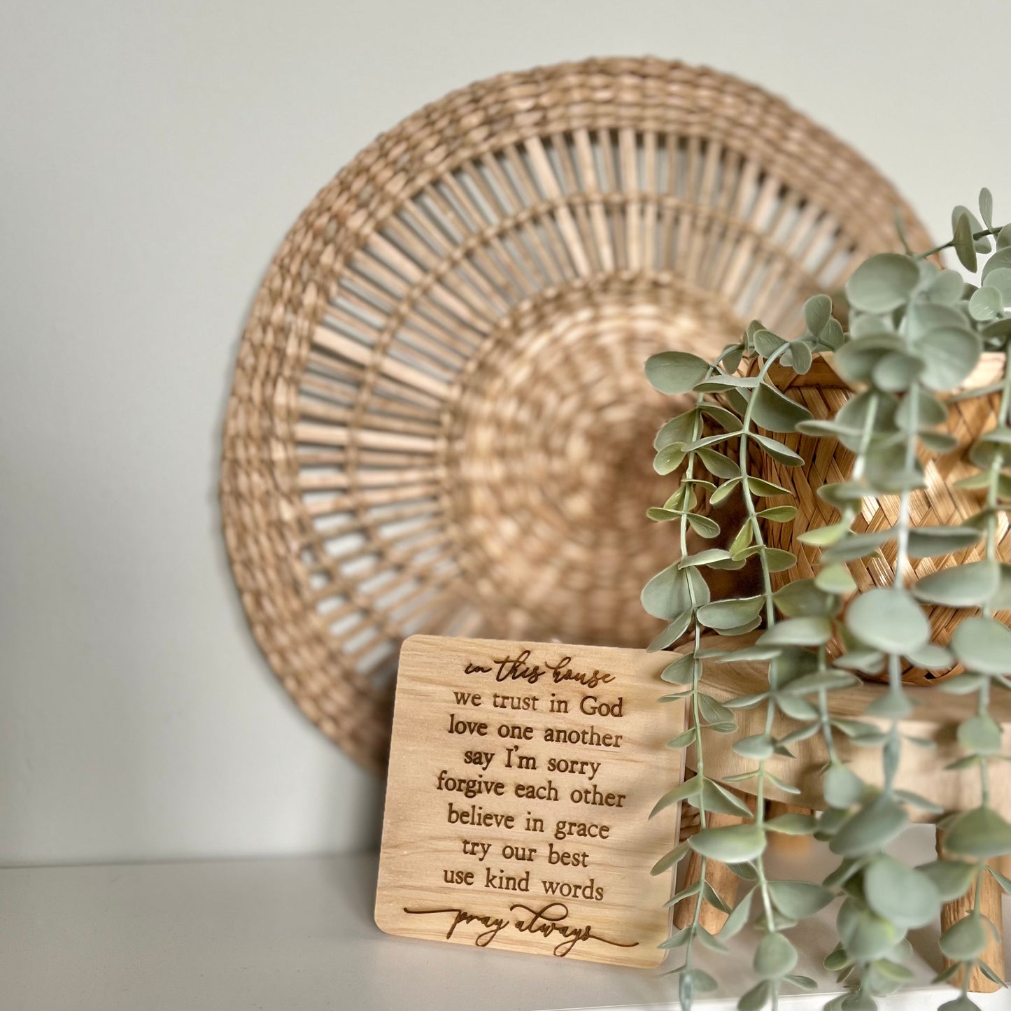 In this house engraved wooden coaster