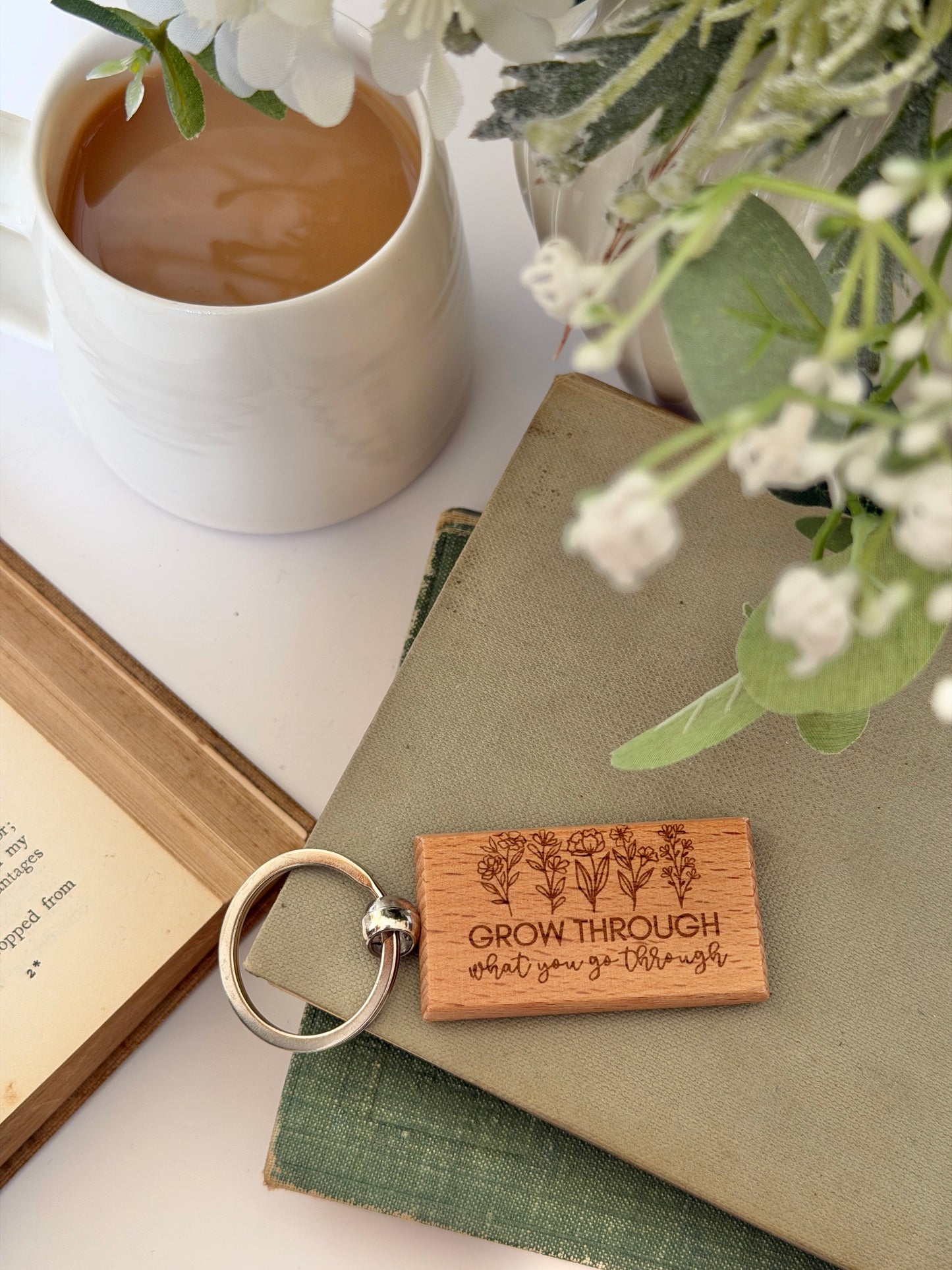 Grow through what you go through engraved keyring