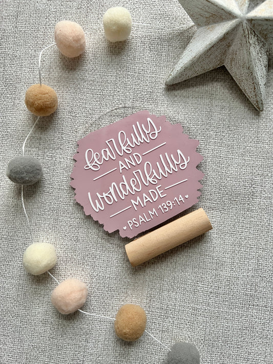 Fearfully and wonderfully made acrylic plaque