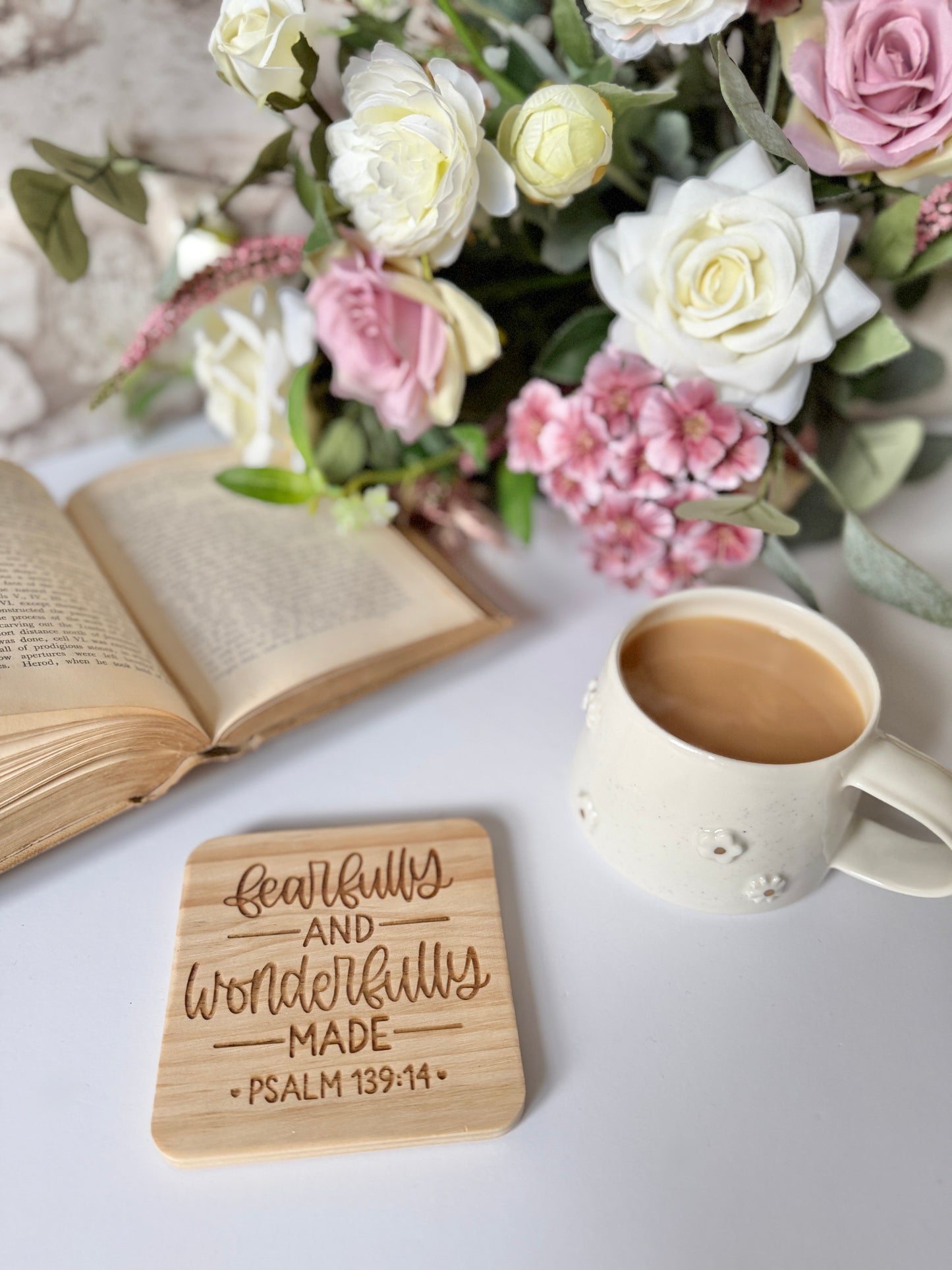 Fearfully and wonderfully made engraved wooden coaster