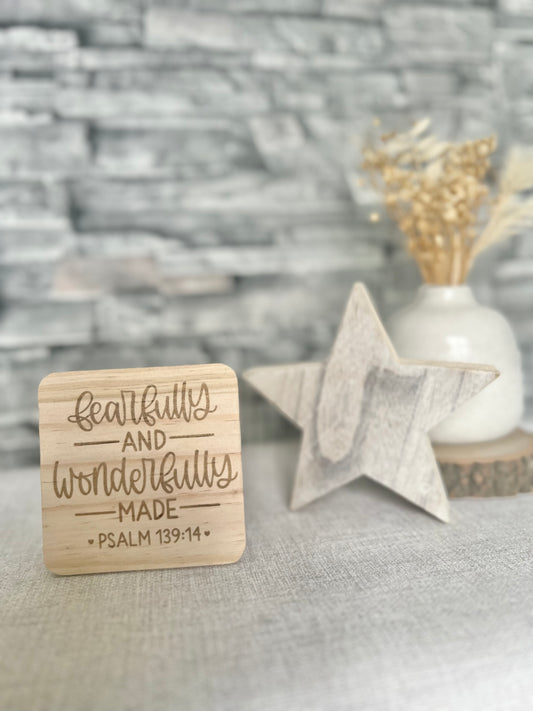 Fearfully and wonderfully made engraved wooden coaster