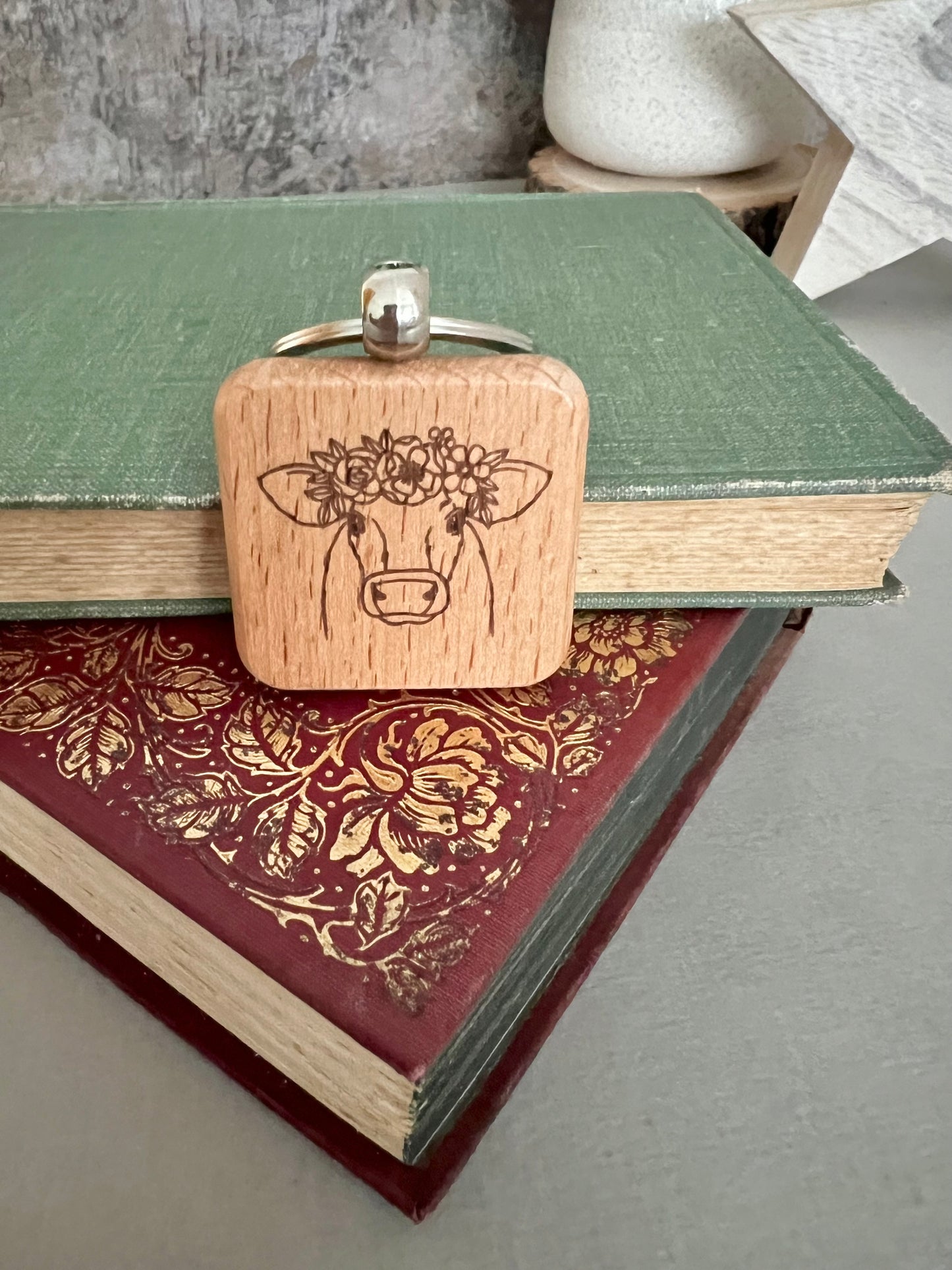 Cow flowers engraved keyring