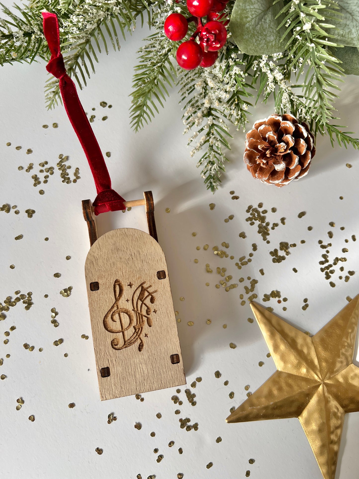 Music notes engraved wooden sleigh tree decoration