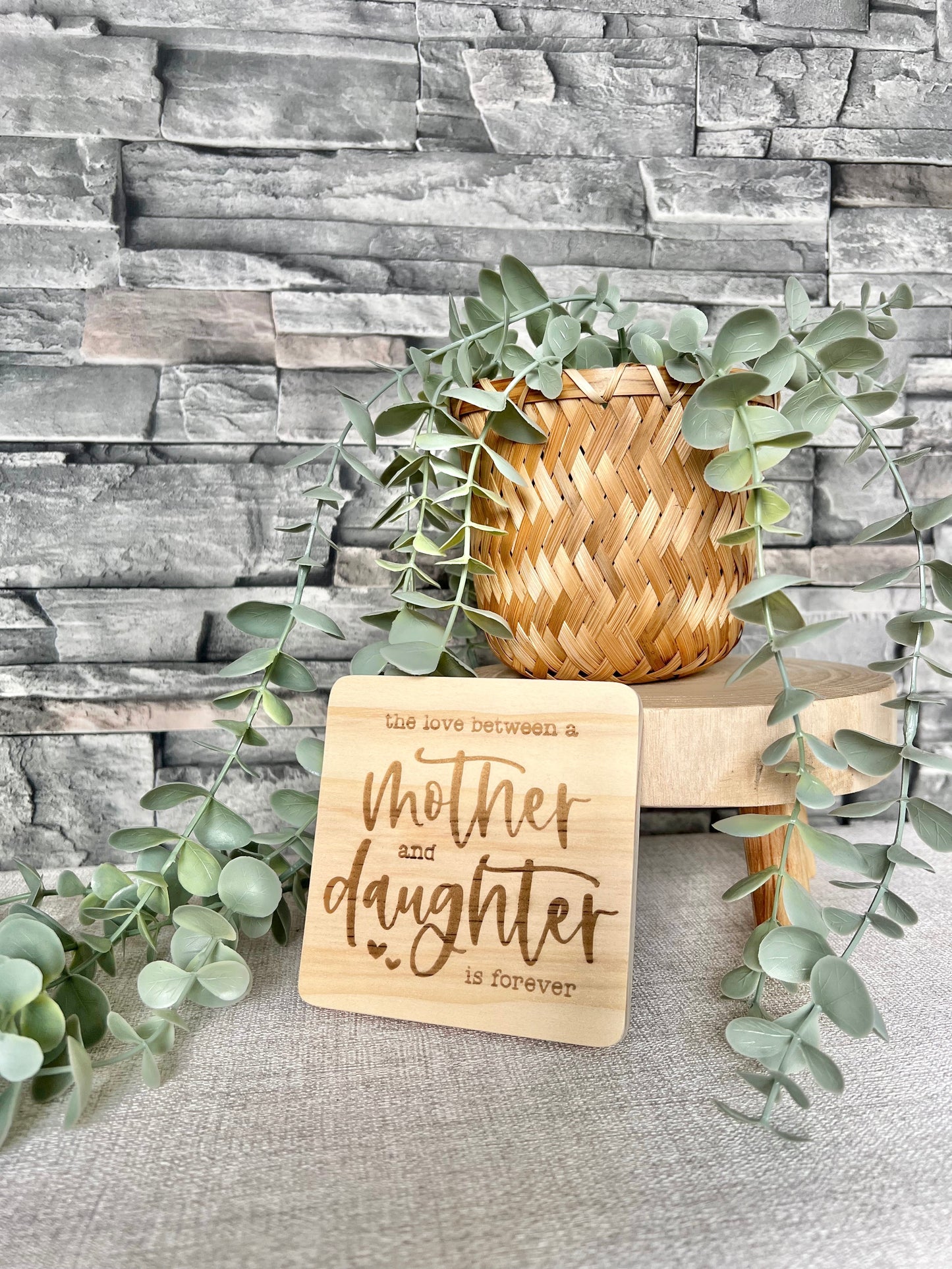 The love between a mother and daughter engraved wooden coaster