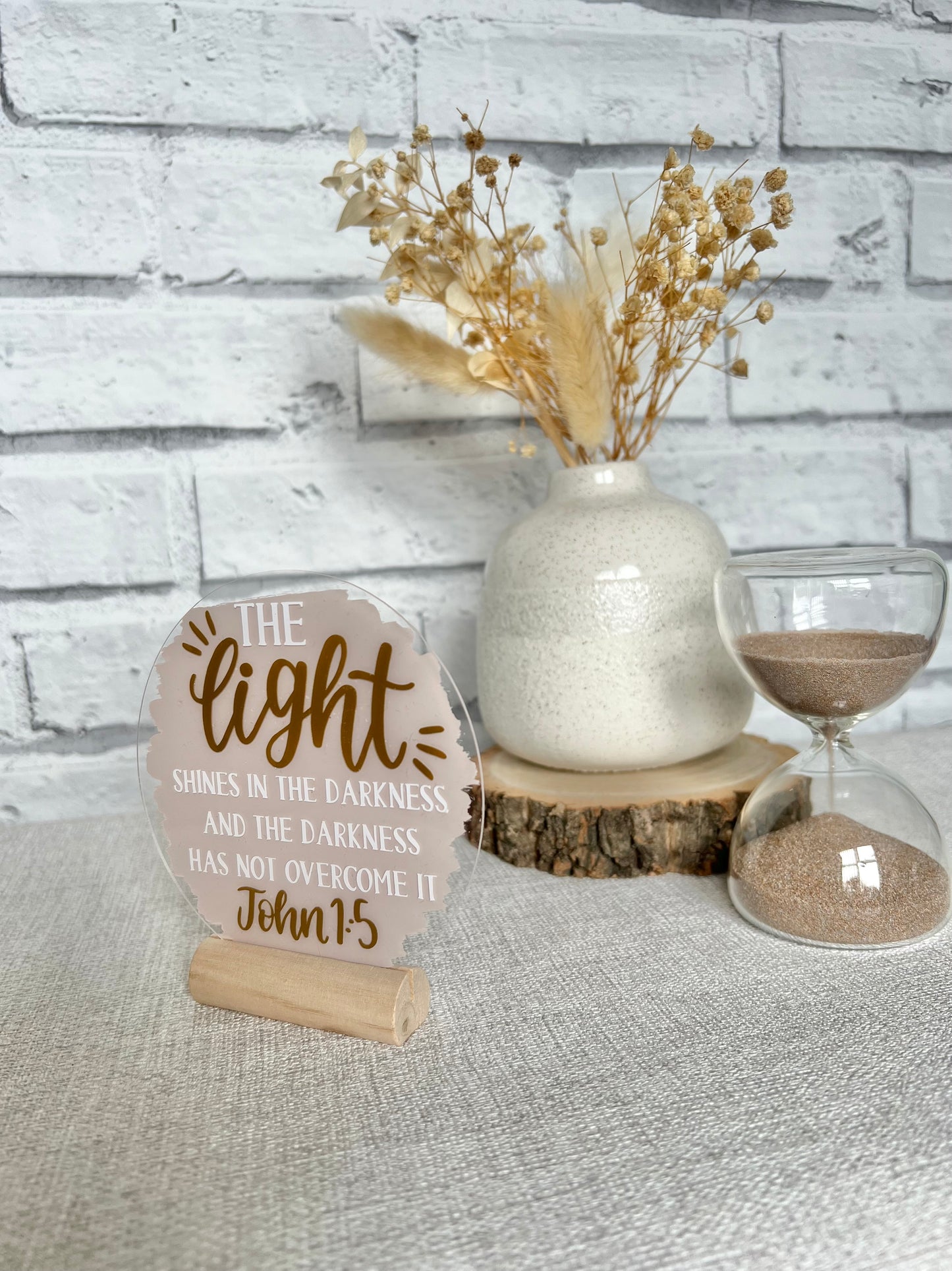 The light shines in the darkness acrylic plaque