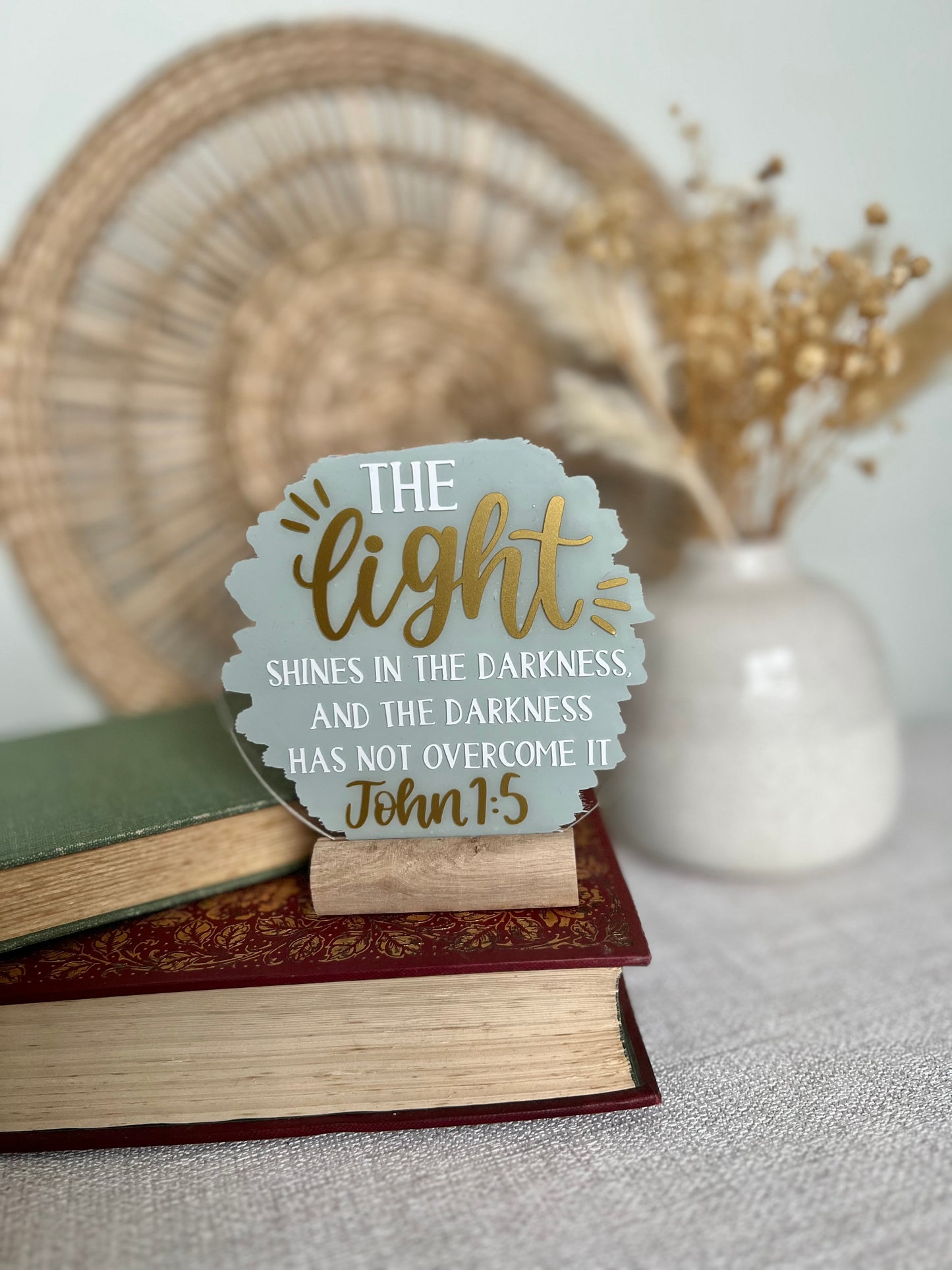 The light shines in the darkness acrylic plaque