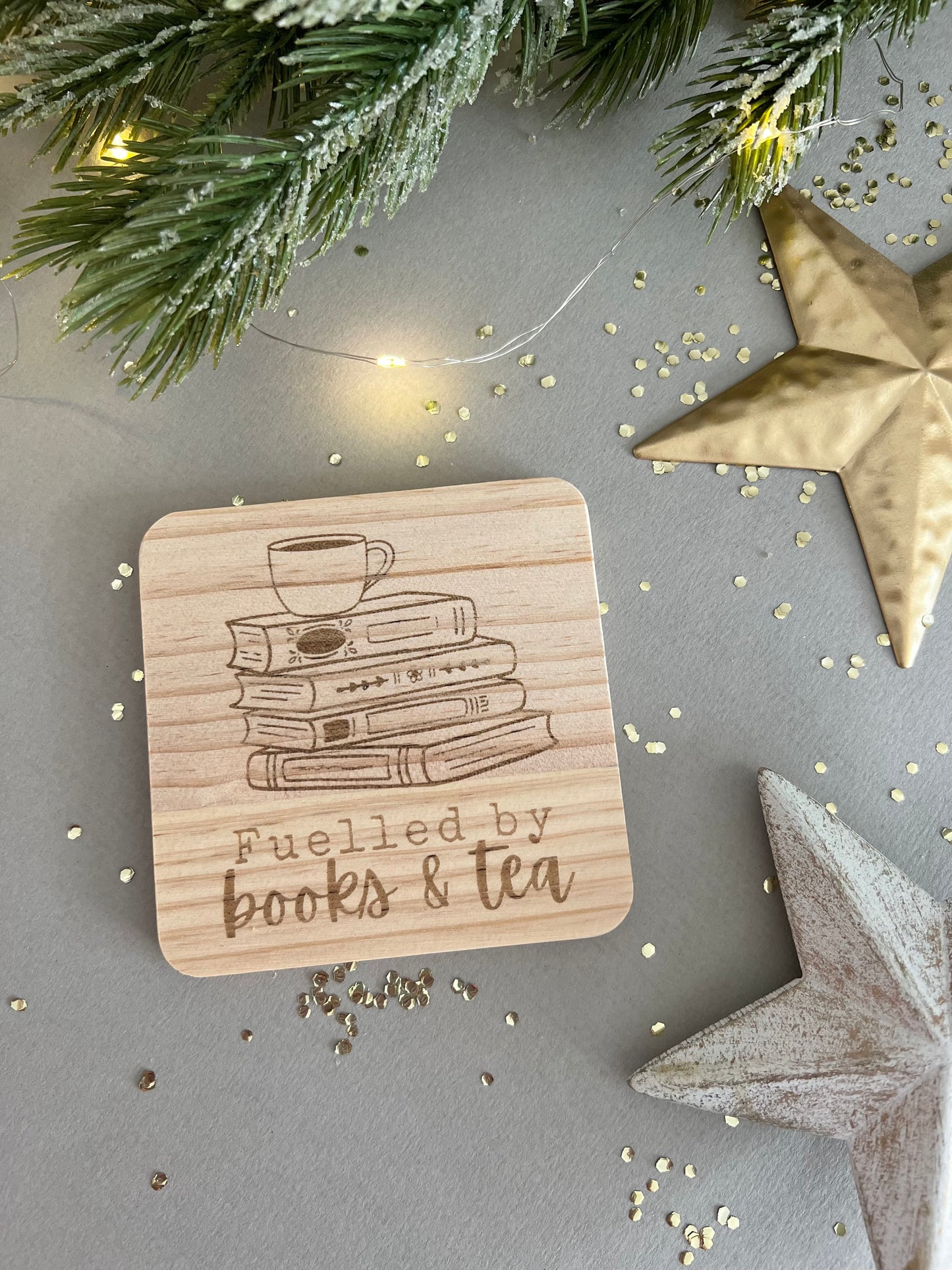 Fuelled by books and tea engraved wooden coaster