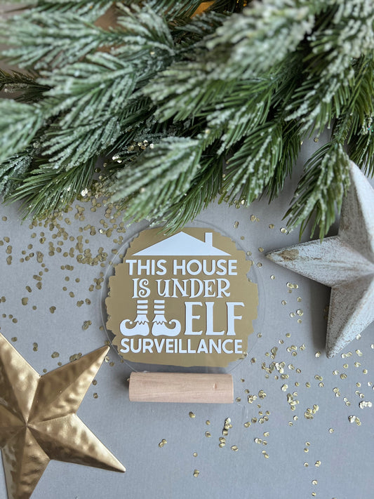 This house is under elf surveillance acrylic plaque