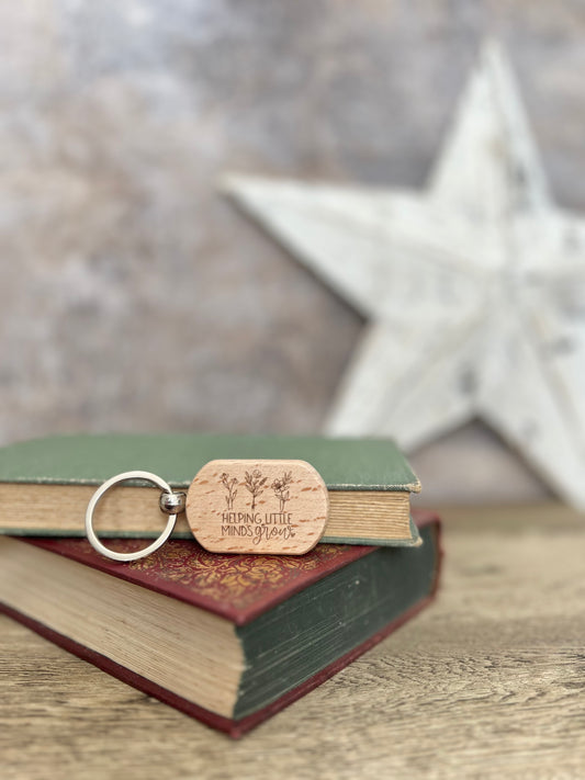 Helping little minds grow engraved keyring
