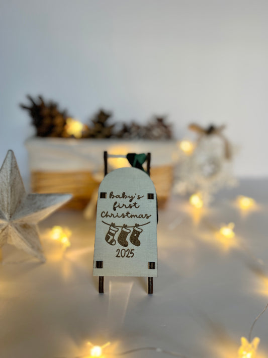 Baby’s First Christmas 2025 engraved wooden sleigh tree decoration