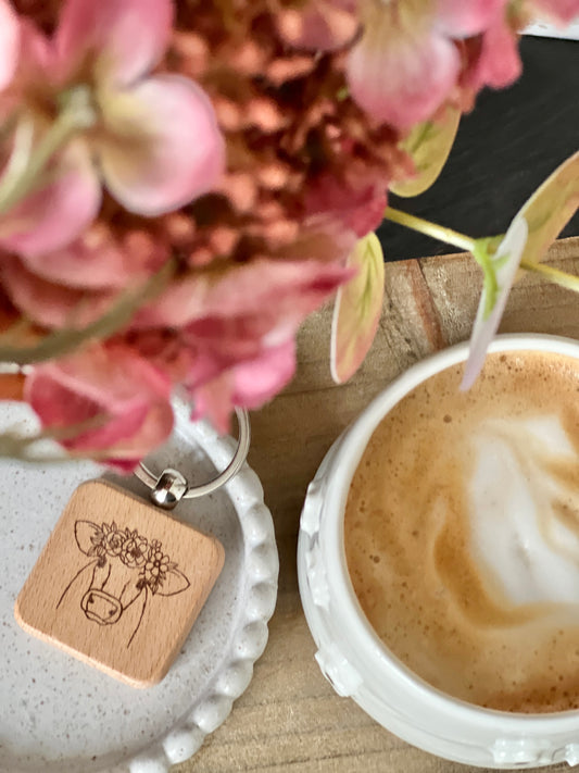 Cow flowers engraved keyring