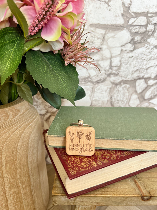 Helping little minds grow engraved keyring