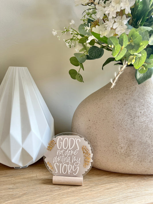 God’s not done writing my story acrylic plaque