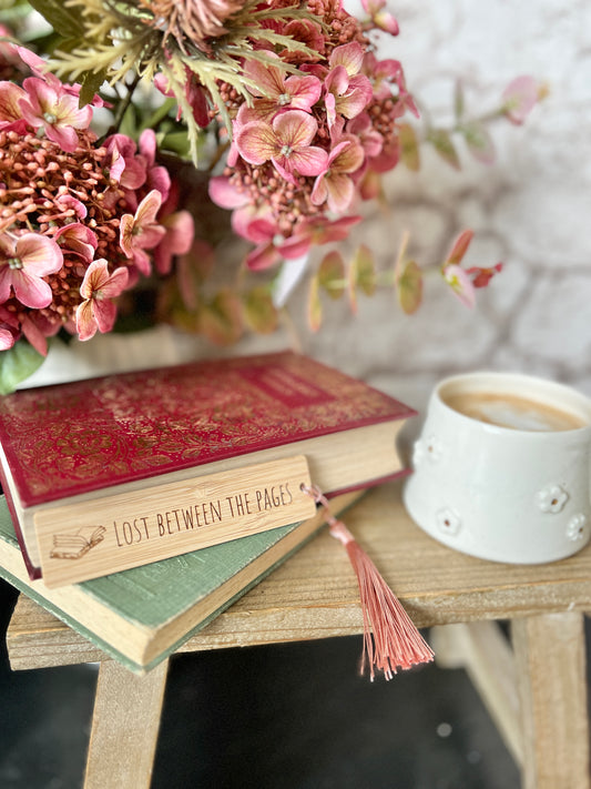 Lost between the pages wooden engraved bookmark