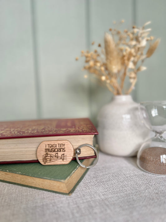 I teach tiny musicians engraved keyring
