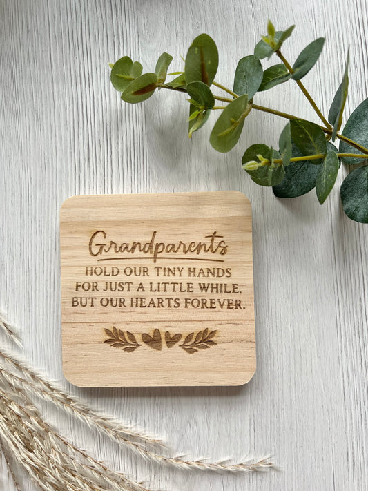 Grandparents hold our tiny hands engraved wooden coaster