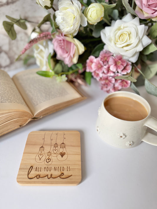 All you need is love engraved wooden coaster